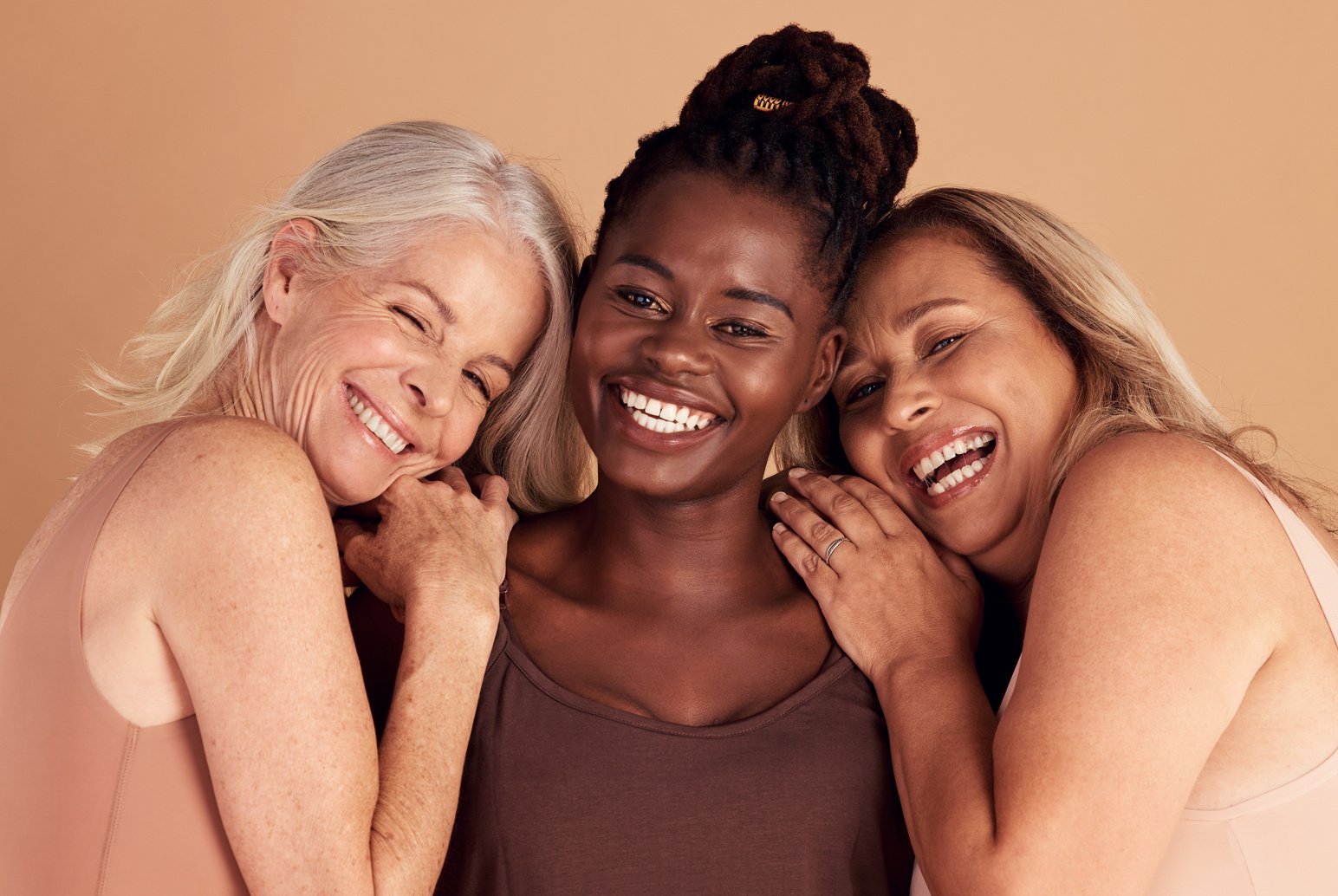 Beauty, Diversity and Portrait of Women with Self Love, Happy and Positive Mindset in Studio. Support, Feminism and Group of Friends with Woman Empowerment, Pride and Community by Brown Background.