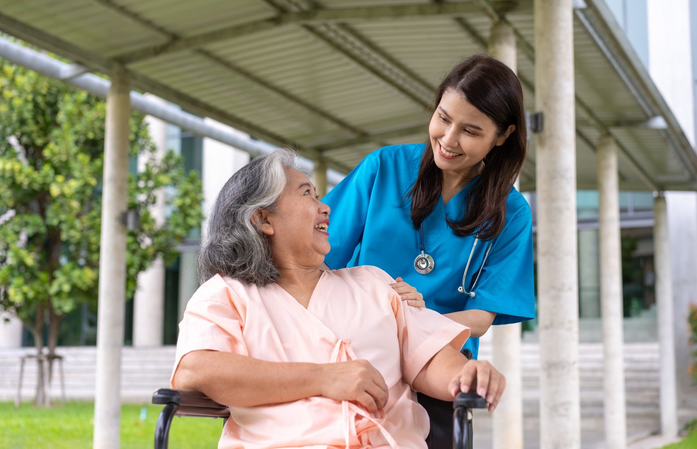 Asian careful caregiver or nurse taking care of the patient